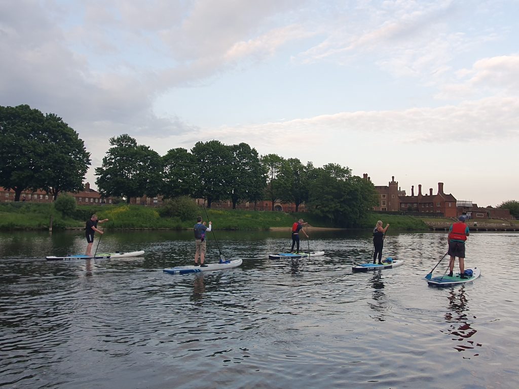 Paddlers heading upstream to Hampton Court